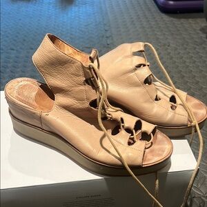 Andre Assous Cream Wedge Sandals with Lace-Up Design